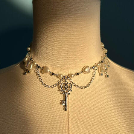 | Silver Key Necklace | $17 |