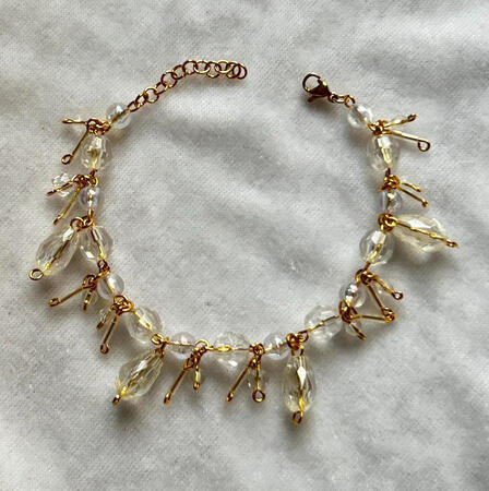| Clear Gold Braclet | $10 |