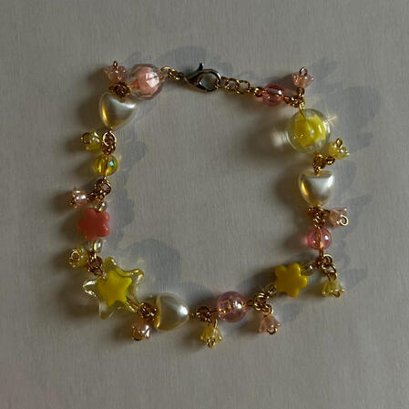| Gold &amp; Pink Flower Bracelet | $8 |